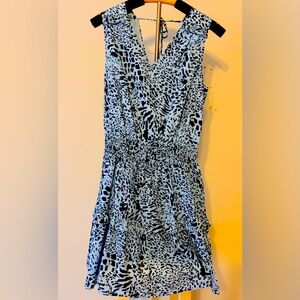 Sleeveless dress with tie back